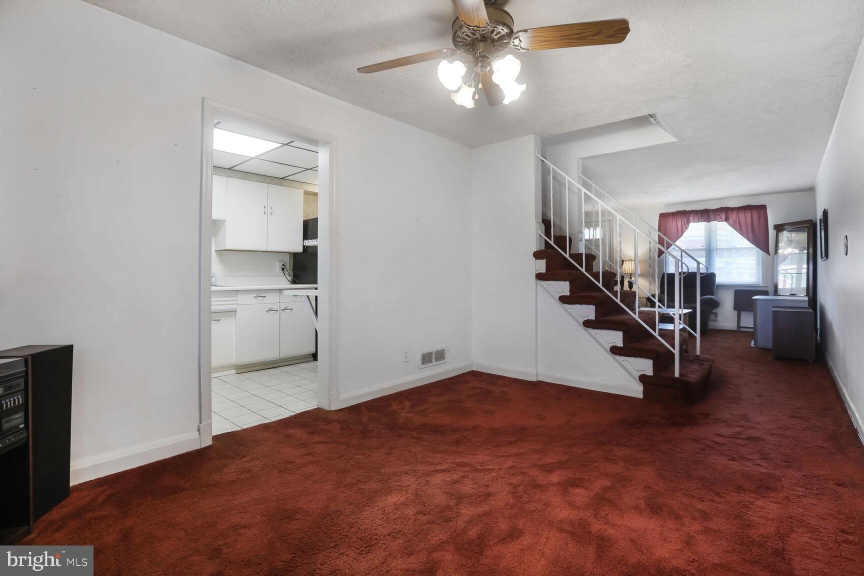 1892 Church Road Baltimore, MD 21222 - Photo 4 of 20 a view of a livingroom with a staircase