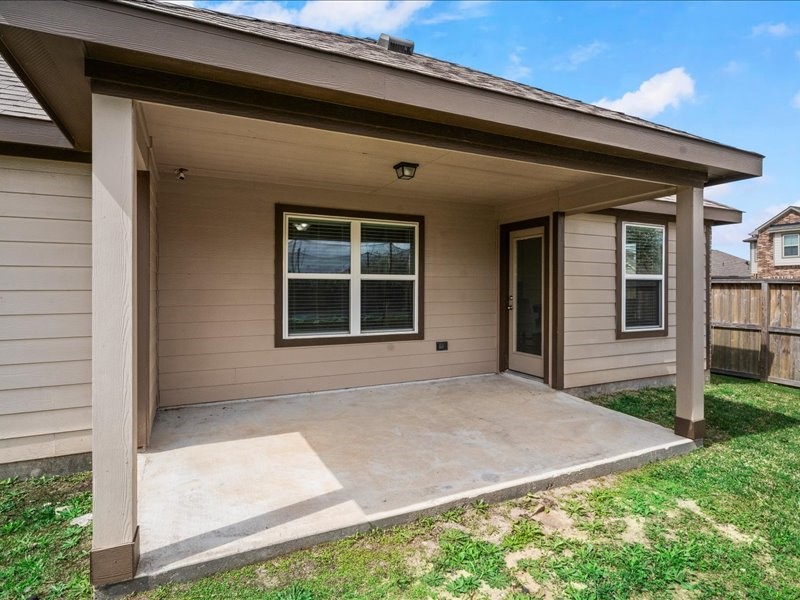 9203 Waldrick Trace Drive Rosharon, TX 77583 - Photo 31 of 35 a front view of a house with a yard