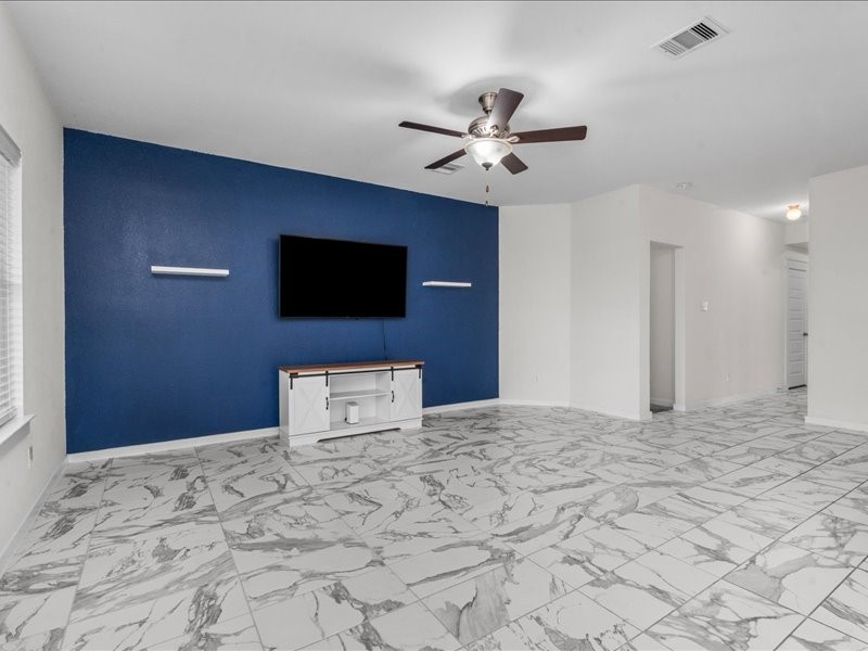 9203 Waldrick Trace Drive Rosharon, TX 77583 - Photo 10 of 35 a view of a livingroom with a flat screen tv