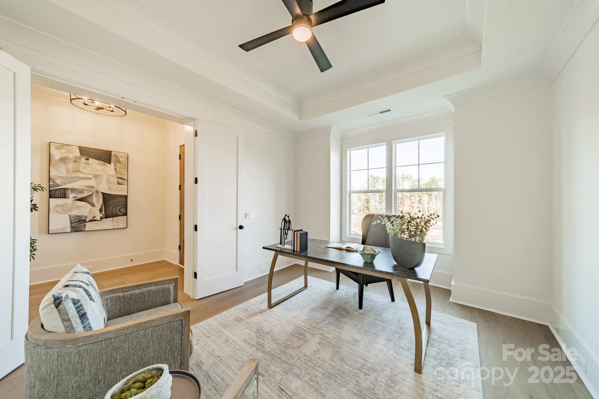 19032 Newburg Hill Road, Unit 23 Davidson, NC 28036 - Photo 25 of 39 a living room with furniture and a window