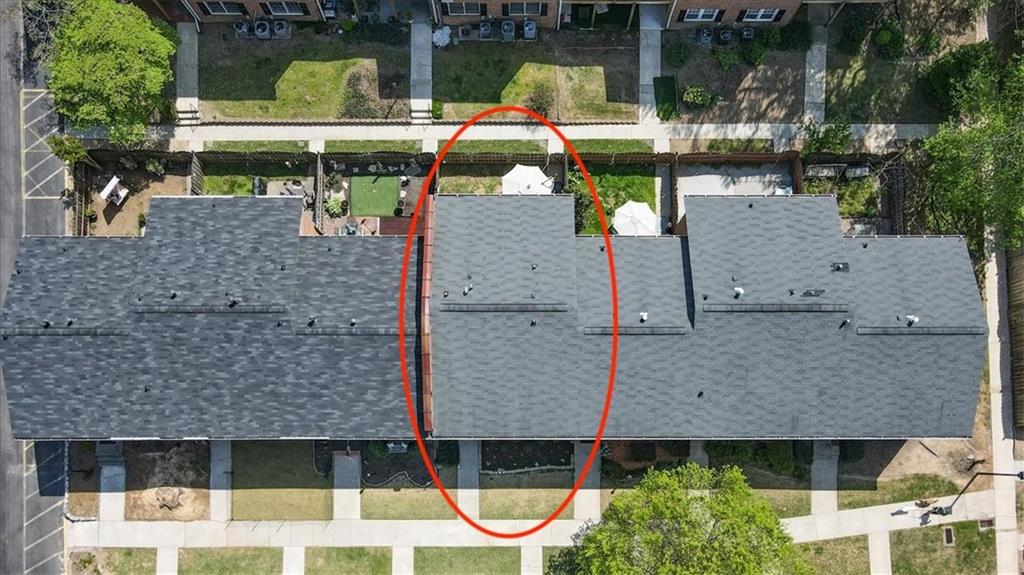 6520 Roswell Road, Unit 88 Atlanta, GA 30328 - Photo 1 of 1 an aerial view of a house with a lake view