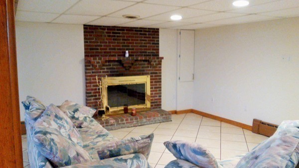 106 Mishawum Road Woburn, MA 01801 - Photo 18 of 23 a living room with furniture