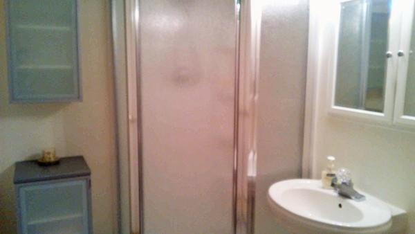 106 Mishawum Road Woburn, MA 01801 - Photo 20 of 23 a bathroom with a sink and a mirror