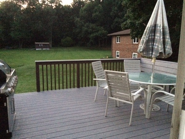 106 Mishawum Road Woburn, MA 01801 - Photo 21 of 23 a view of a chairs and table on the wooden deck