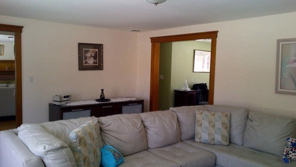 106 Mishawum Road Woburn, MA 01801 - Photo 3 of 23 a bedroom with a bed and a window
