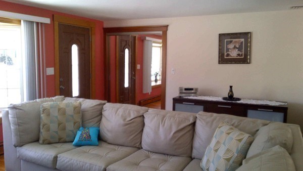 106 Mishawum Road Woburn, MA 01801 - Photo 4 of 23 a living room with furniture and window