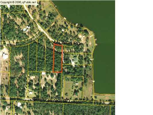 48 Spring Lake Road DeFuniak Springs, FL 32433 - Photo 2 of 2 a picture of a green field
