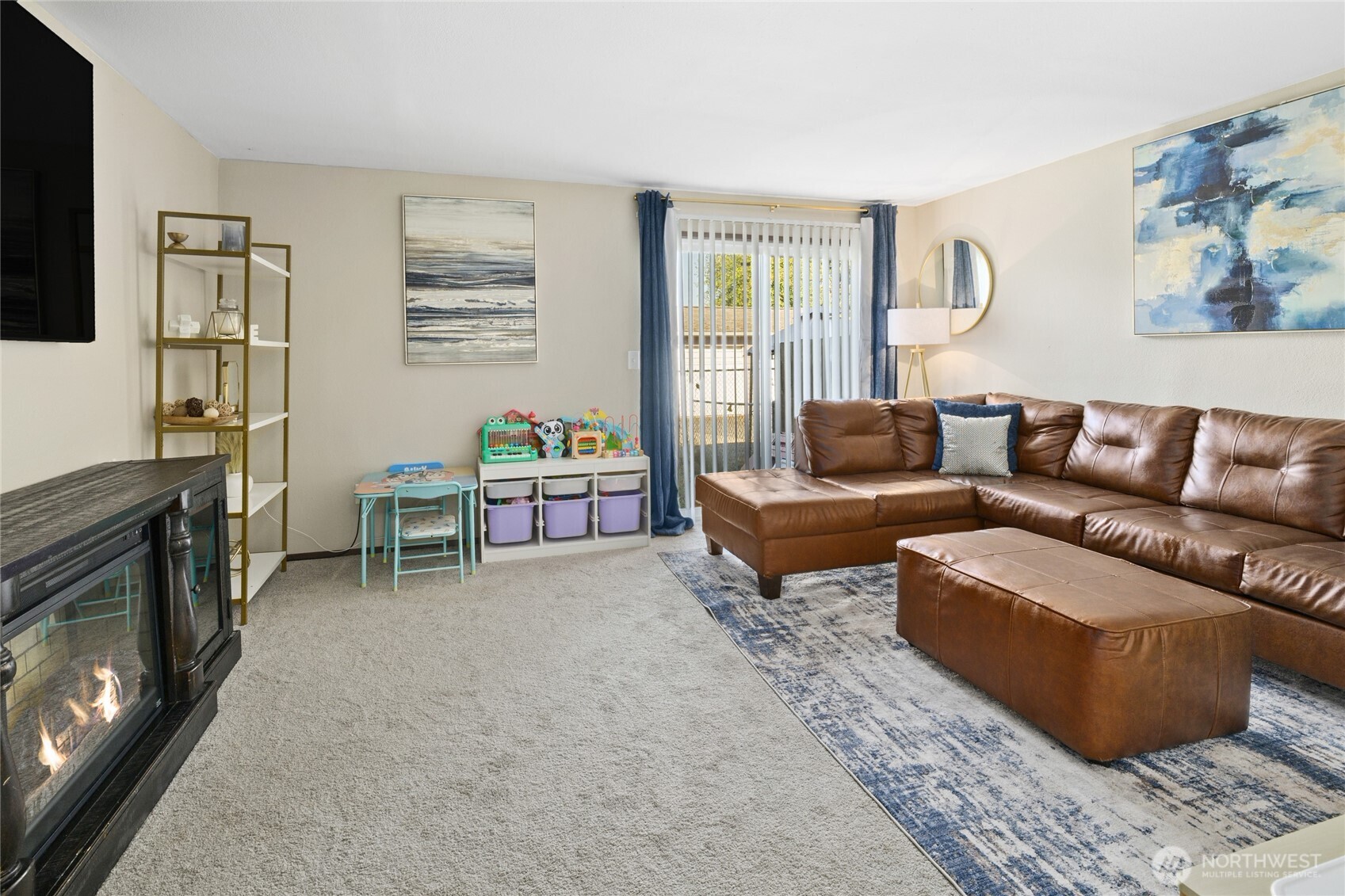 429 37th Street Southeast Auburn, WA 98002 - Photo 13 of 21 a living room with furniture and a fireplace