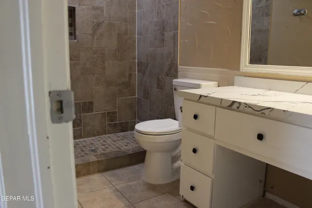 a view of hallway with wooden floor
