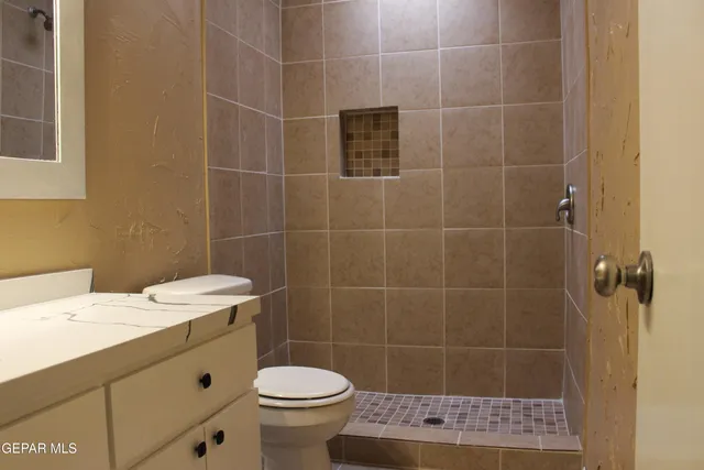 a view of a small space with wooden floor