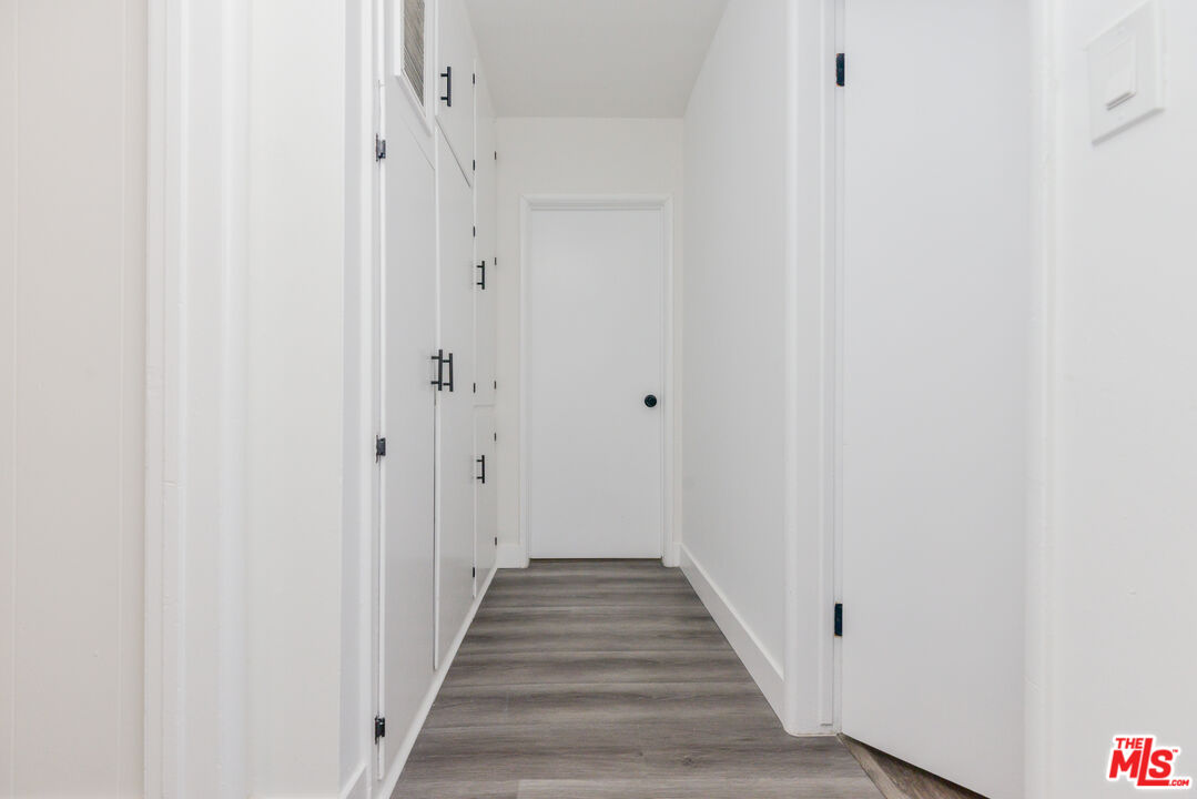 2107 Pullman Lane, Unit A Redondo Beach, CA 90278 - Photo 11 of 42 a view of a hallway with wooden floor and entryway