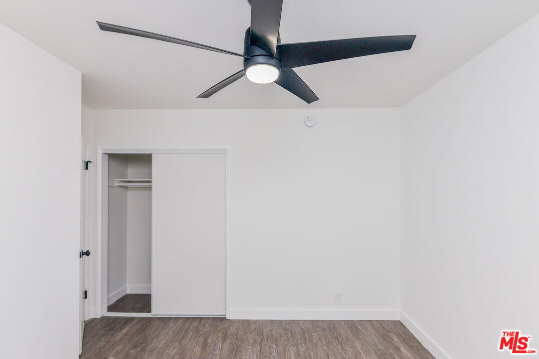 2107 Pullman Lane, Unit A Redondo Beach, CA 90278 - Photo 22 of 42 a view of a room with wooden floor and cabinet