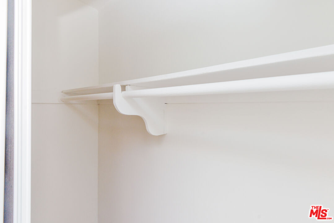 2107 Pullman Lane, Unit A Redondo Beach, CA 90278 - Photo 26 of 42 a close up view of racks on the wall