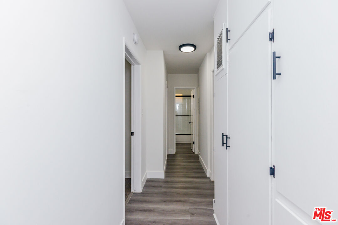 2107 Pullman Lane, Unit A Redondo Beach, CA 90278 - Photo 29 of 42 a view of a hallway with the wooden floor