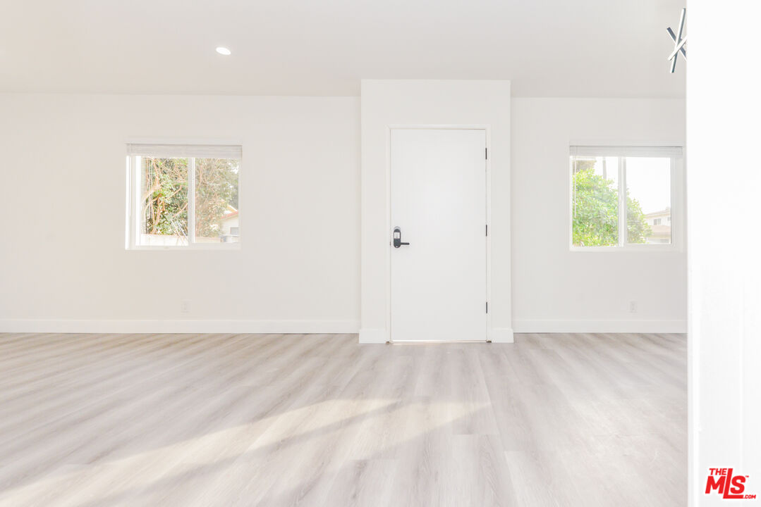 2107 Pullman Lane, Unit A Redondo Beach, CA 90278 - Photo 10 of 42 an empty room with windows