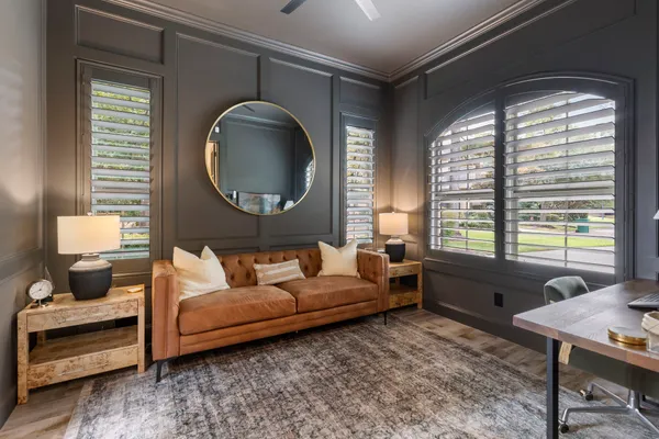 a living room with furniture and a window
