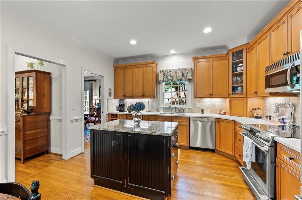 1457 Ridgemere Lane Winston-Salem, NC 27106 - Photo 10 of 39 The den is to the left of the kitchen
