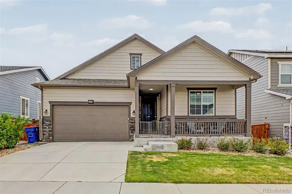front view of house with a yard