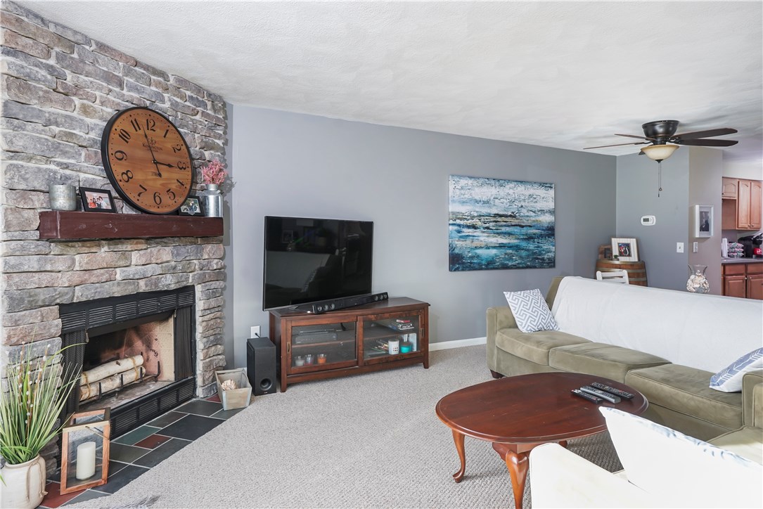 161 West Shore Road, Unit C4 Warwick, RI 02889 - Photo 4 of 14 Spacious living room with gas fireplace