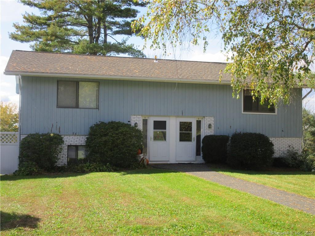 6 Cedarbrook Road, Unit 6 Brookfield, CT 06804 - Photo 1 of 1 a backyard of a house with barbeque oven and outdoor seating