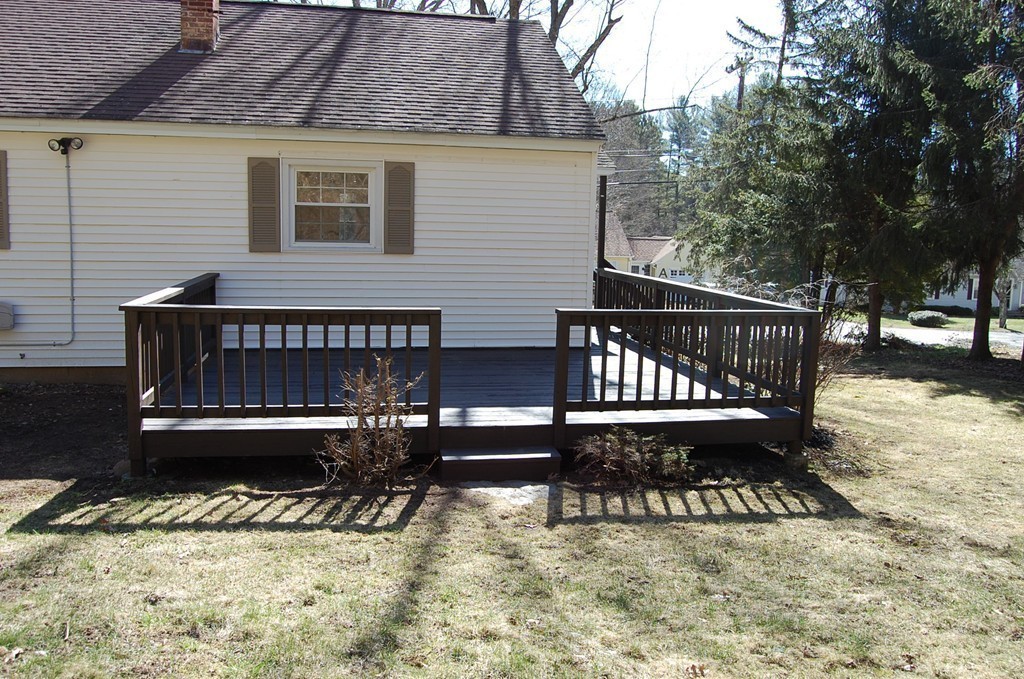 139 Valley Road Barre, MA 01005 - Photo 15 of 15 a view of a house with a wooden deck