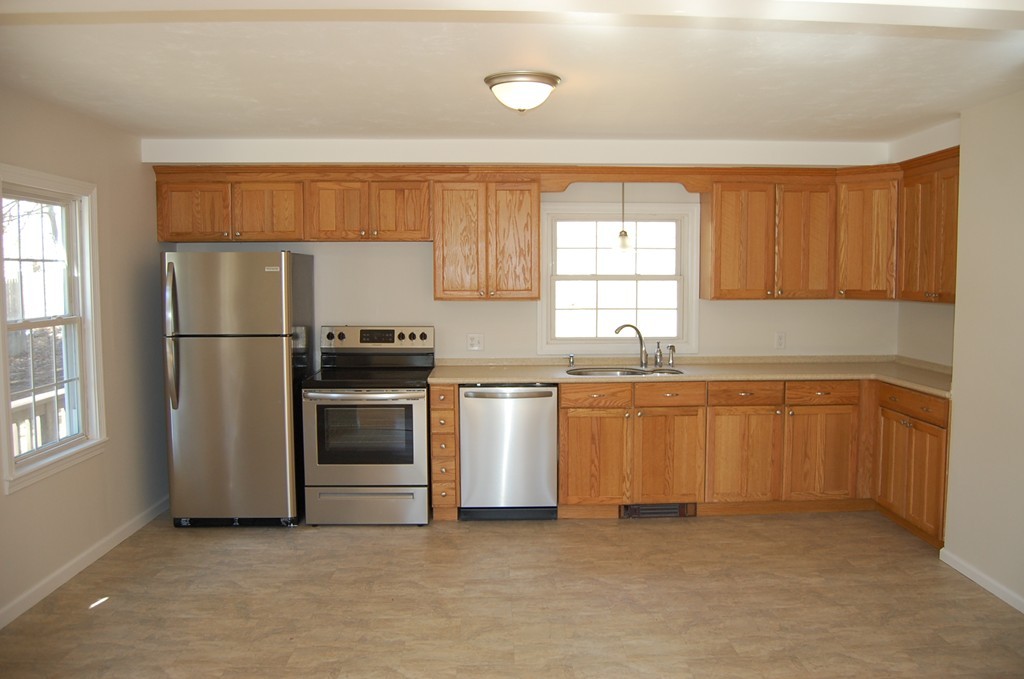 139 Valley Road Barre, MA 01005 - Photo 3 of 15 a kitchen with stainless steel appliances a refrigerator sink and cabinets
