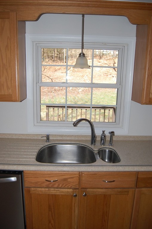 139 Valley Road Barre, MA 01005 - Photo 4 of 15 a kitchen with a sink and a window