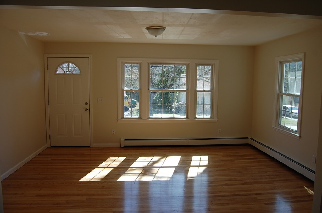 139 Valley Road Barre, MA 01005 - Photo 6 of 15 a view of empty room with wooden floor and fan