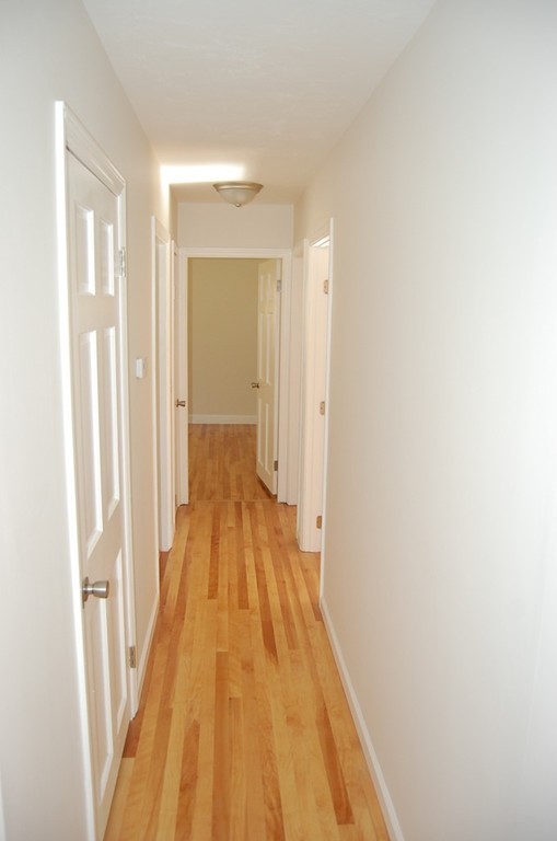 139 Valley Road Barre, MA 01005 - Photo 10 of 15 a view of a hallway with wooden floor