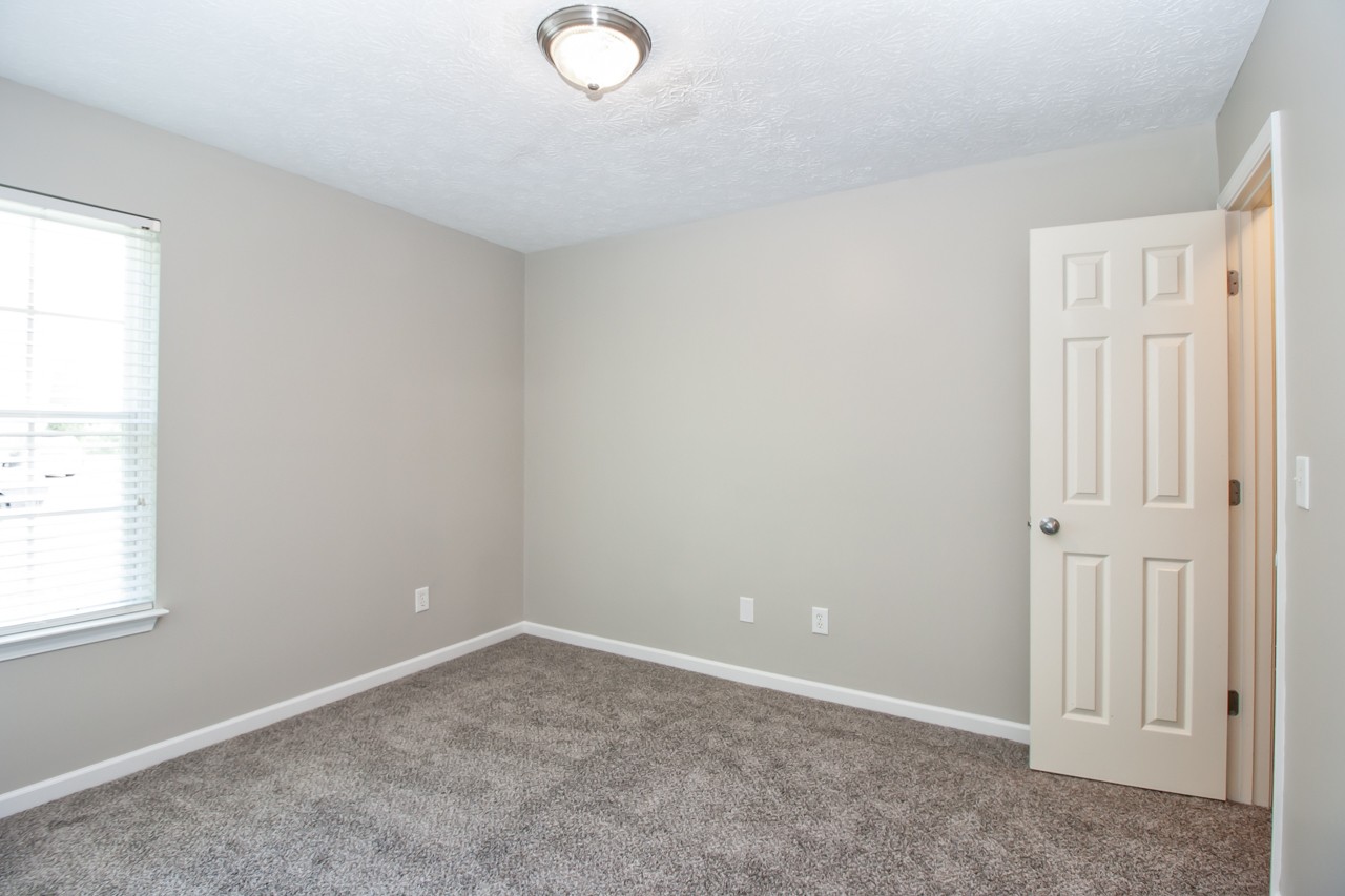 1879 Portway Road Spring Hill, TN 37174 - Photo 11 of 17 an empty room with windows