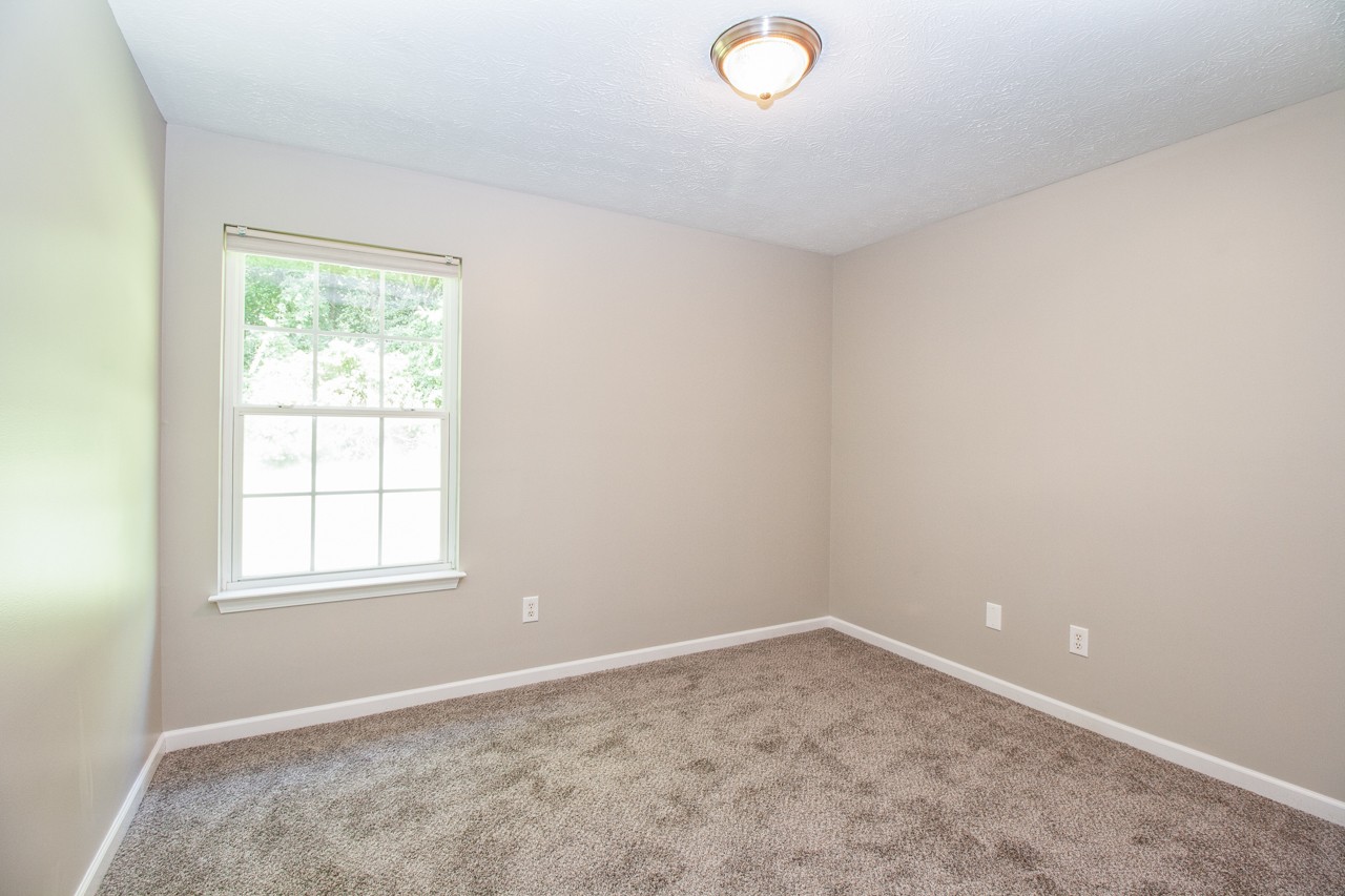 1879 Portway Road Spring Hill, TN 37174 - Photo 13 of 17 an empty room with a window