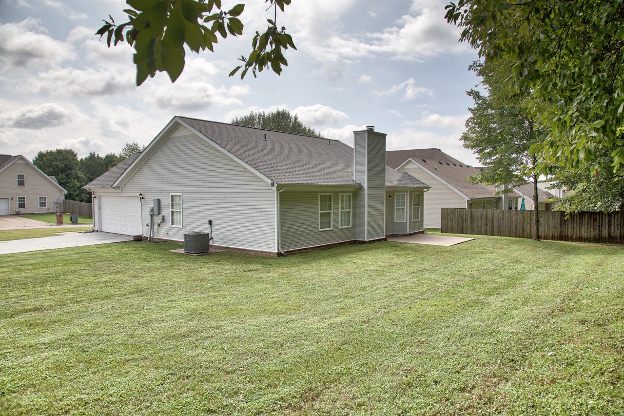 1879 Portway Road Spring Hill, TN 37174 - Photo 3 of 17 a view of a house with a backyard