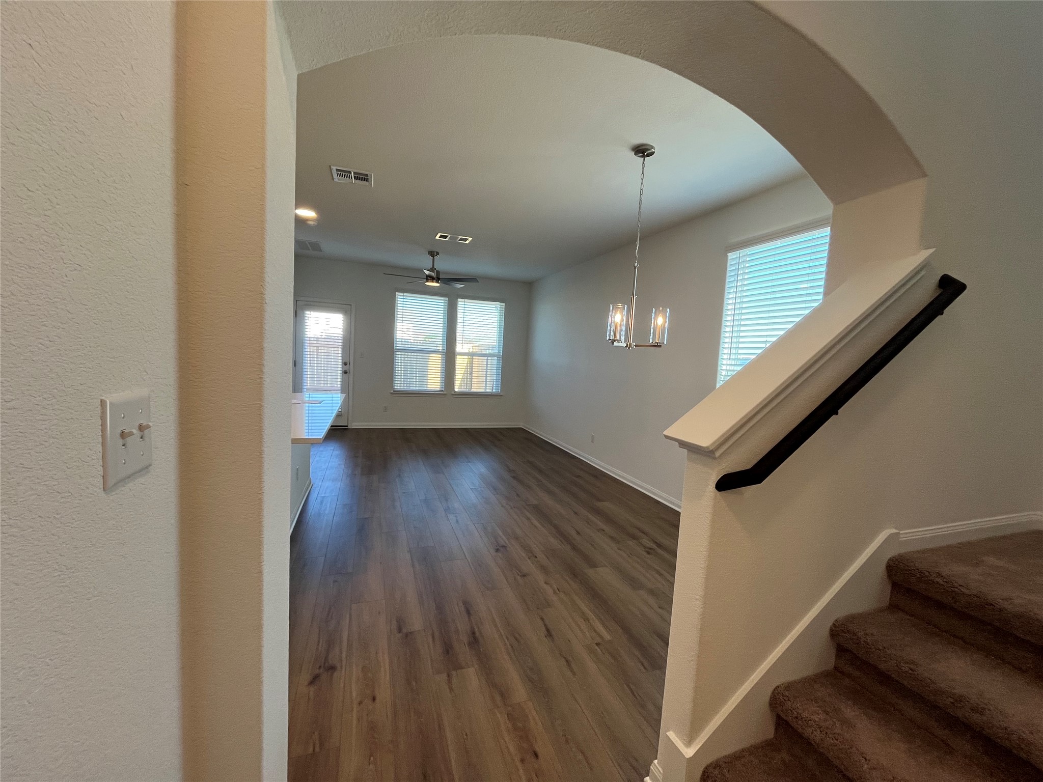 8534 Wellspring Loop Round Rock, TX 78665 - Photo 27 of 32 An inviting open floorplan provides a seamless flow from the entryway to the living area.
