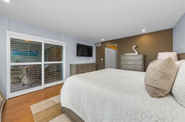 a view of roof deck with outdoor seating and city view