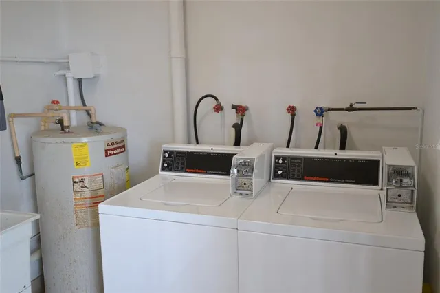 a view of a dining room with furniture and a window