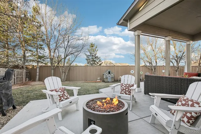a outdoor living space with furniture and garden view