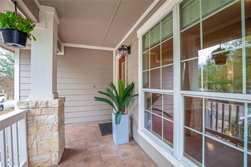 281 Hutton Kyle, TX 78640 - Photo 2 of 37 A welcoming covered front porch with stone accents creates appealing curb appeal.