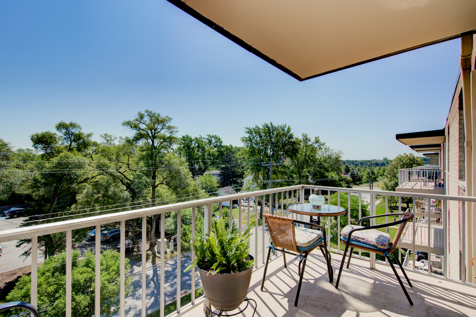 100 West Butterfield Road, Unit 512N Elmhurst, IL 60126 - Photo 11 of 16 a view of a chair and table in the balcony