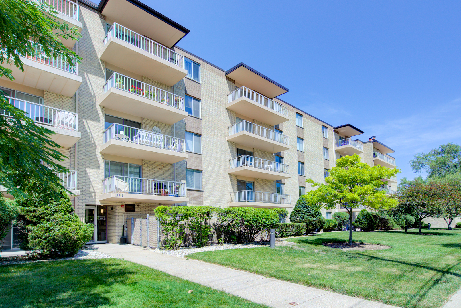 100 West Butterfield Road, Unit 512N Elmhurst, IL 60126 - Photo 16 of 16 a view of a building with a yard
