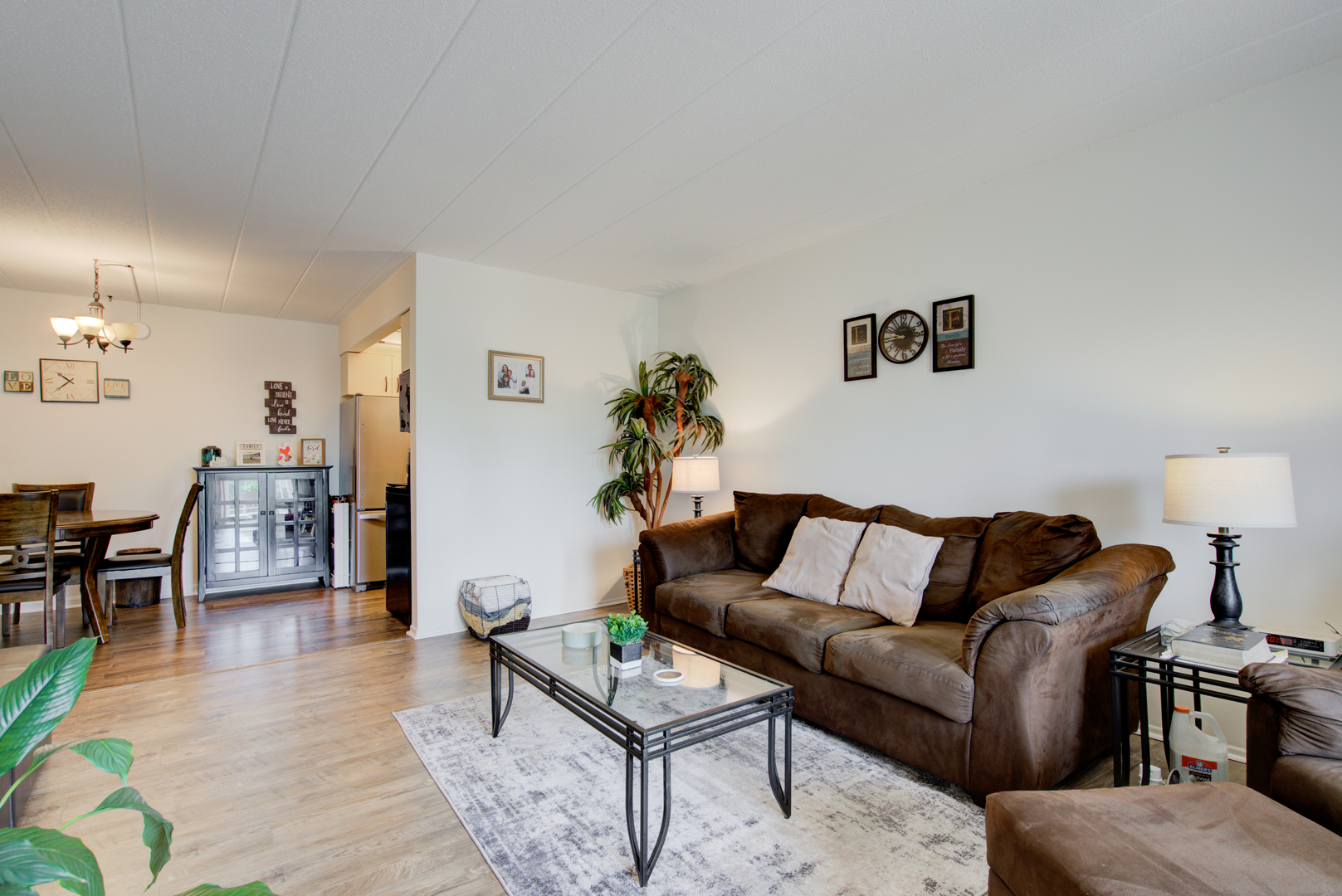 100 West Butterfield Road, Unit 512N Elmhurst, IL 60126 - Photo 7 of 16 a living room with furniture and wooden floor