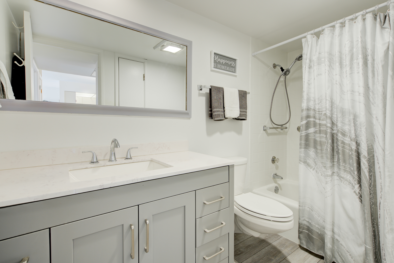100 West Butterfield Road, Unit 512N Elmhurst, IL 60126 - Photo 10 of 16 a bathroom with a sink a toilet and shower