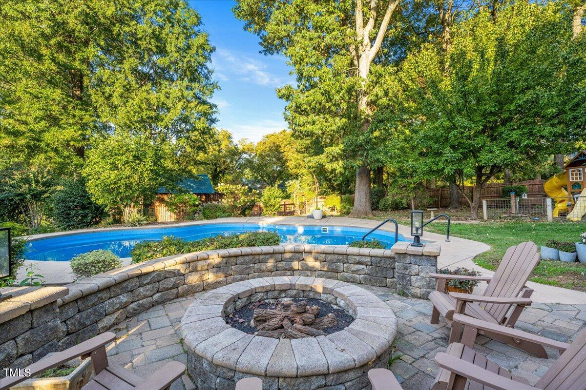 26 Oak Street Roxboro, NC 27573 - Photo 40 of 56 a view of a swimming pool with a patio