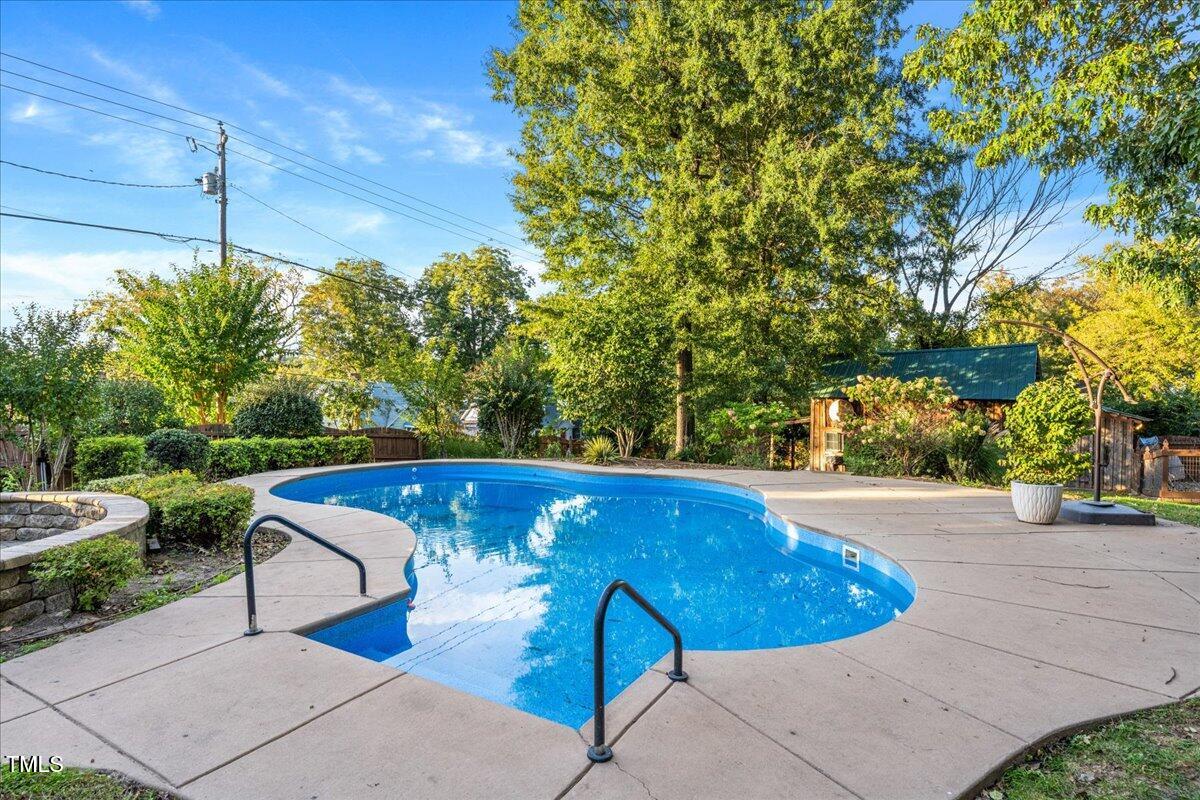 26 Oak Street Roxboro, NC 27573 - Photo 41 of 56 a view of a swimming pool with a patio