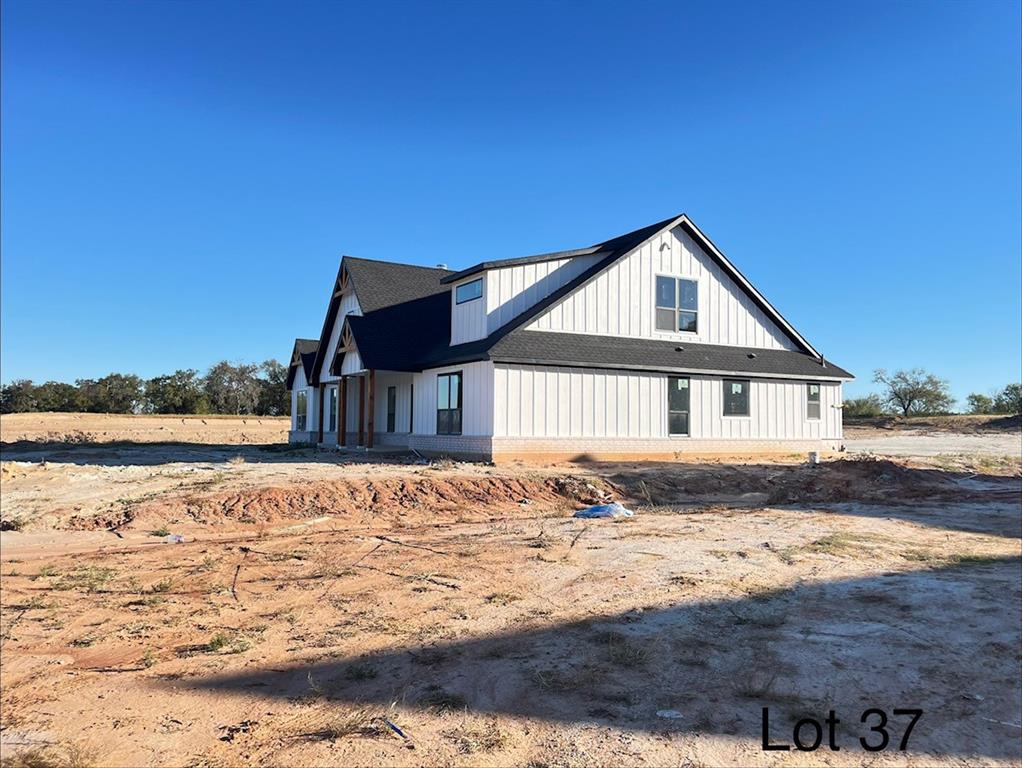 317 Jonny Boy Way Springtown, TX 76082 - Photo 3 of 7 a front view of a house with a yard
