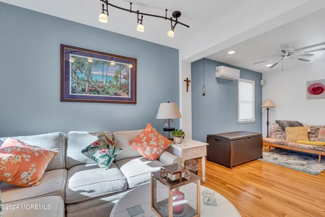 a bedroom with a bed and dresser