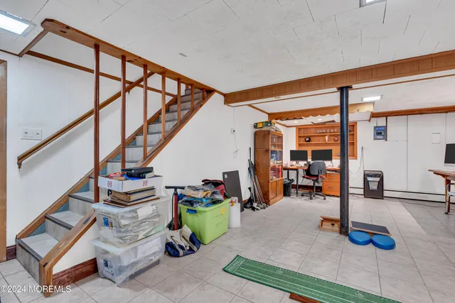a view of a patio with table and chairs and potted plants