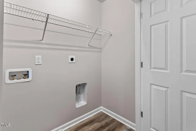 a view of small space with racks on the wall