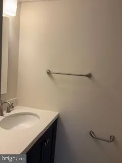 a bathroom with a sink and a vanity