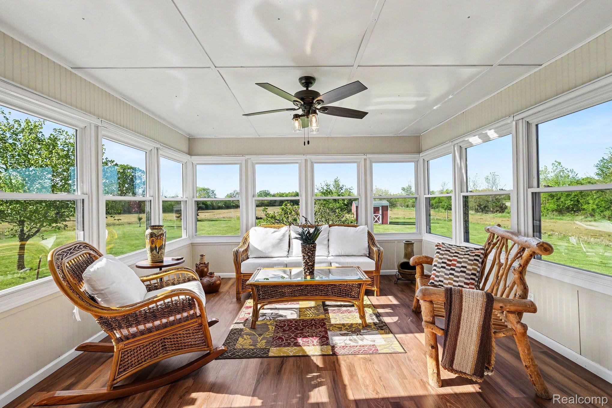 6520 Cook Road Swartz Creek, MI 48473 - Photo 34 of 43 Sunroom / solarium with wood finished floors and baseboards