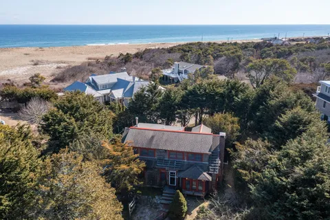 an aerial view of a house with a outdoor space